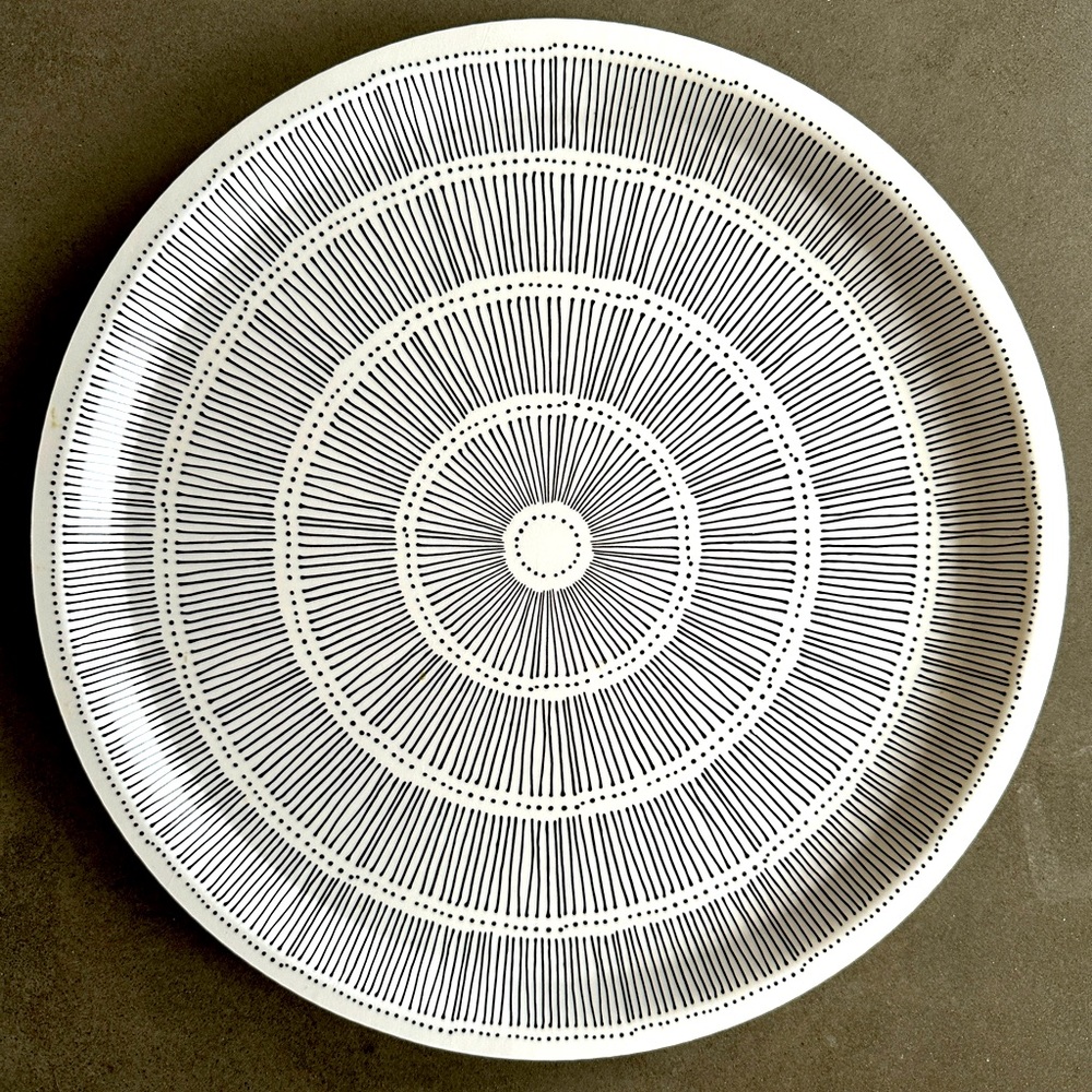Modern, geometric 12” round black and white decorative plate